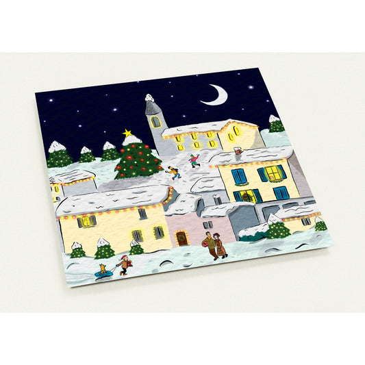 Cosy French village Christmas card featuring charming winter scene with snow-dusted buildings and festive lights, pack of 10 with envelopes