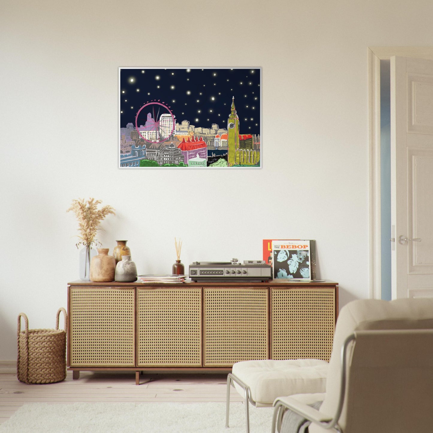 Starry London Skies art print showing iconic London landmarks under a magical starry night sky in wooden frame - on lounge wall