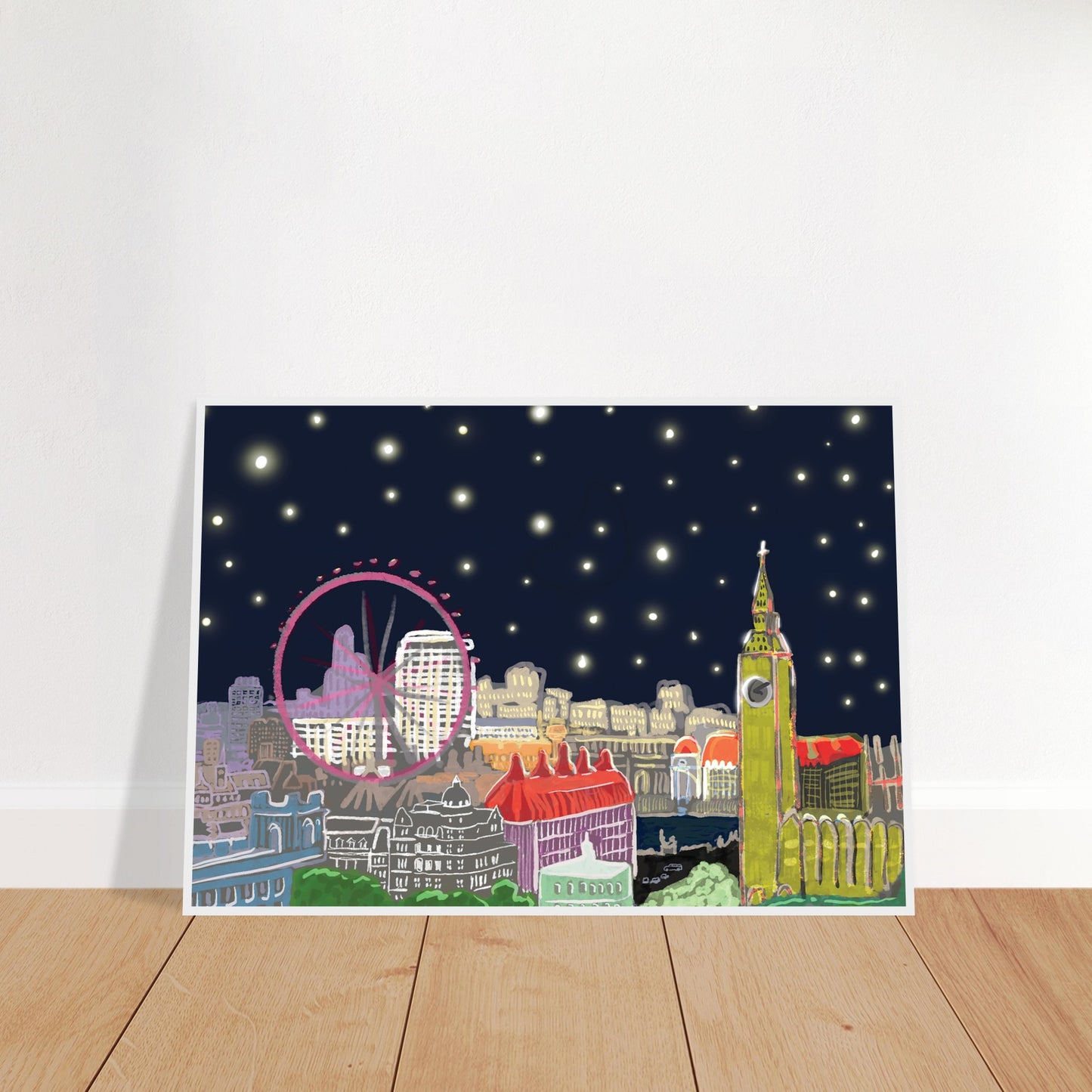 Starry London Skies art print showing iconic London landmarks under a magical starry night sky in wooden frame leaning against wall
